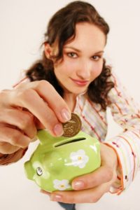 Woman with Piggy Bank Image